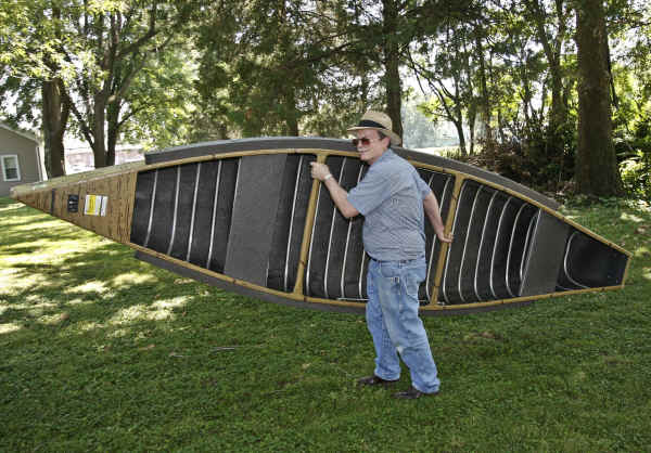 Sportspal Canoe Being Carried - S-13 Square stern