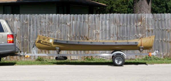 Trailex SUT-200-S Trailer with a 13 ' Square Stern Sportspal Canoe