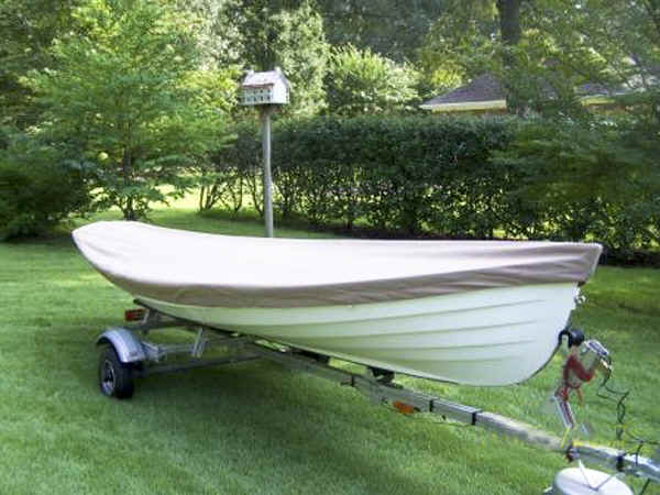 Melon Seed Rowing Skiff on the Trailex-SUT-500-S Boat Trailer